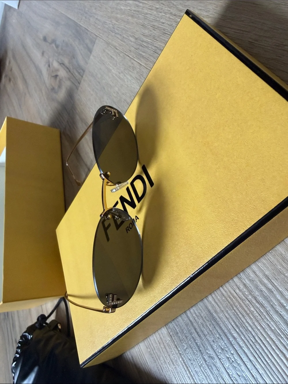 Fendi Slim Oval Sunglasses in Dark Brown and Gold